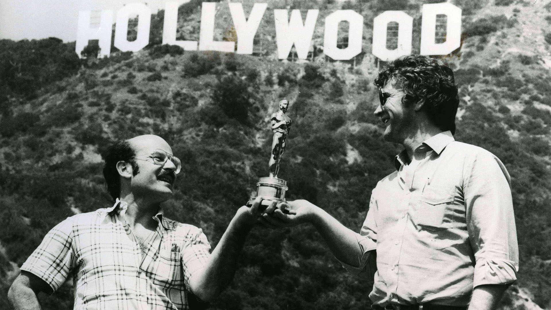 Volker Schlöndorff mit Eberhard Junkersdorf vor dem Hollywood-Schild in Los Angeles, 1980